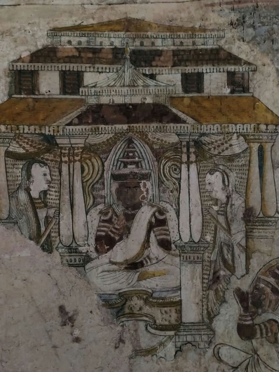 Kandyan-period wall painting at Hindagala Rajamaha Viharaya of a seated figure in a pavilion, attended by two figures
