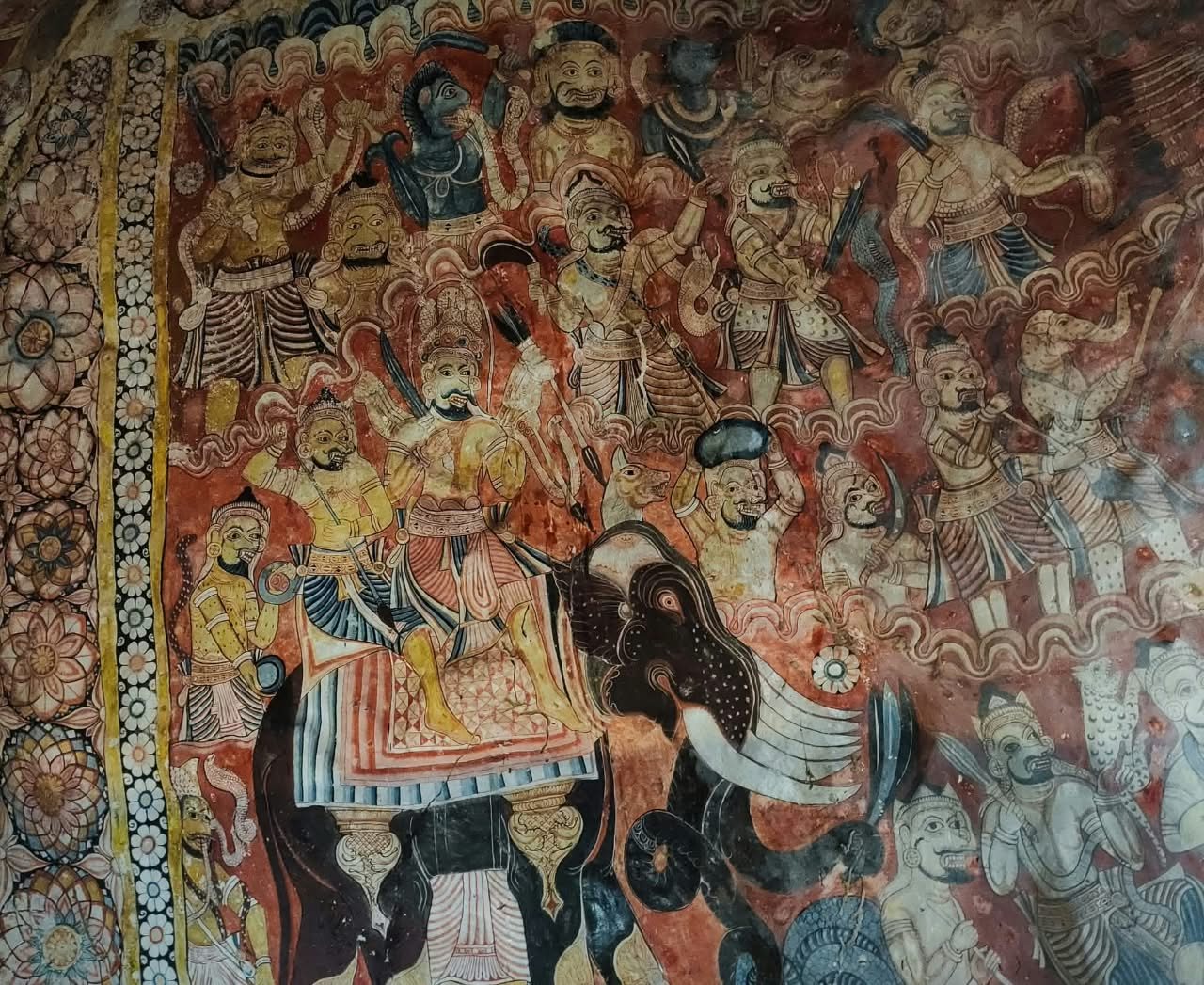 Kandyan-period wall paintings at Hindagala Rajamaha Viharaya, with a royal figure riding an elephant among a procession